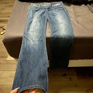 Joe’s Jeans flare jeans. Small rip on belt loop